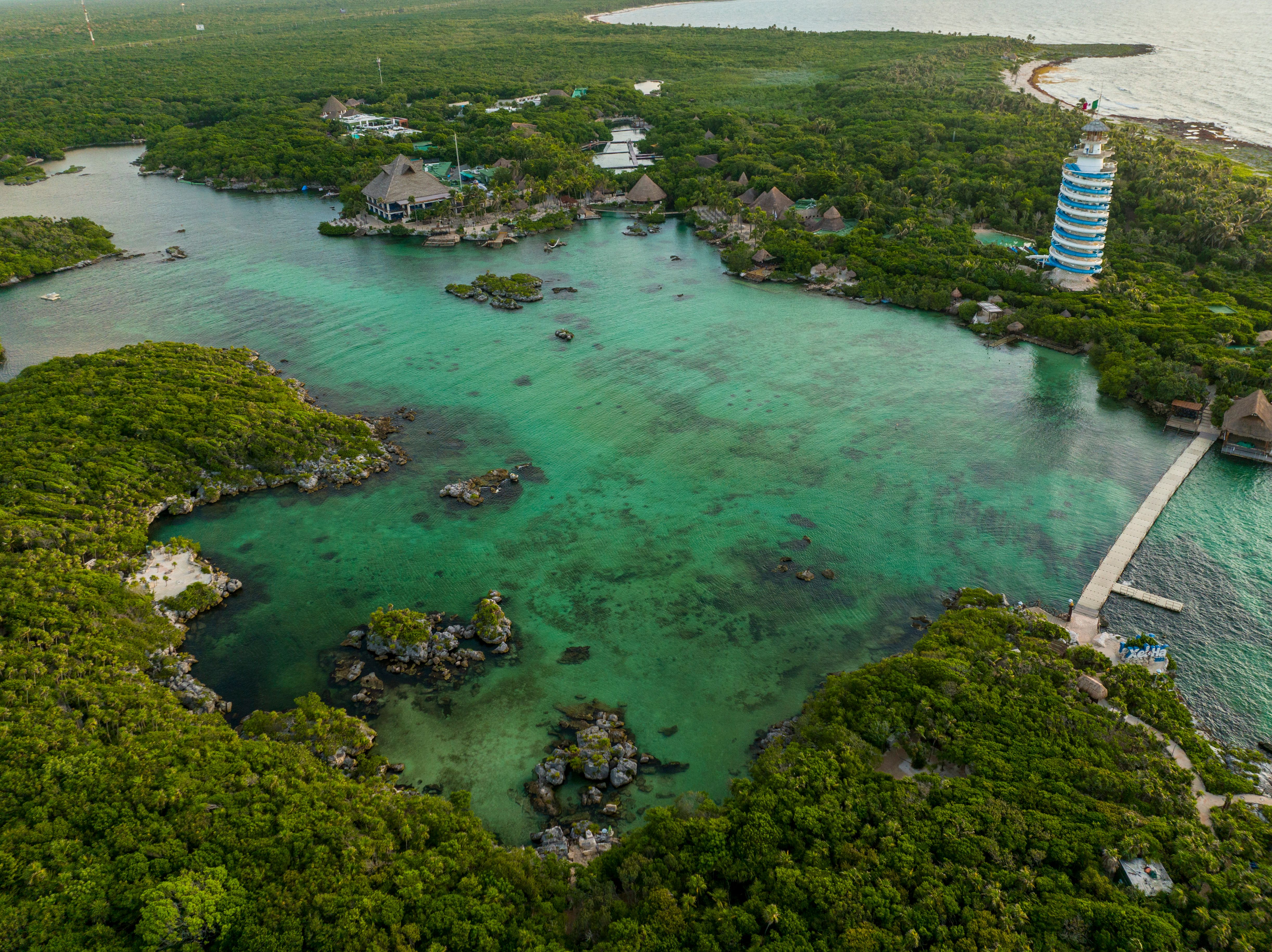 Tourists swimming in an underground river at Xcaret Park, Riviera Maya