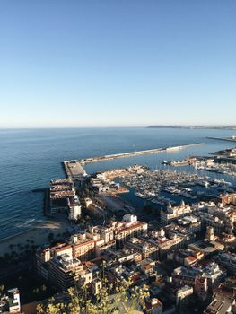 Stunning aerial view of Alicante's harbor, skyline, and seafront in Spain.