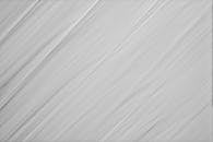 A white and gray background with a white and gray brush