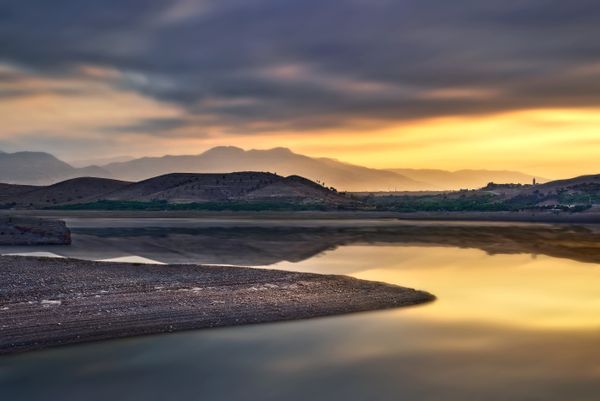Clouds over Lake at Sunset · Free Stock Photo