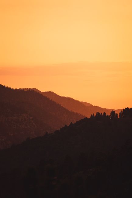 Stunning silhouette of mountains at sunset in California, USA.