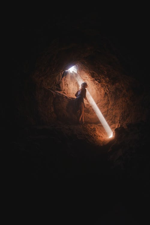 Free Photo Of Person Inside Cave Stock Photo