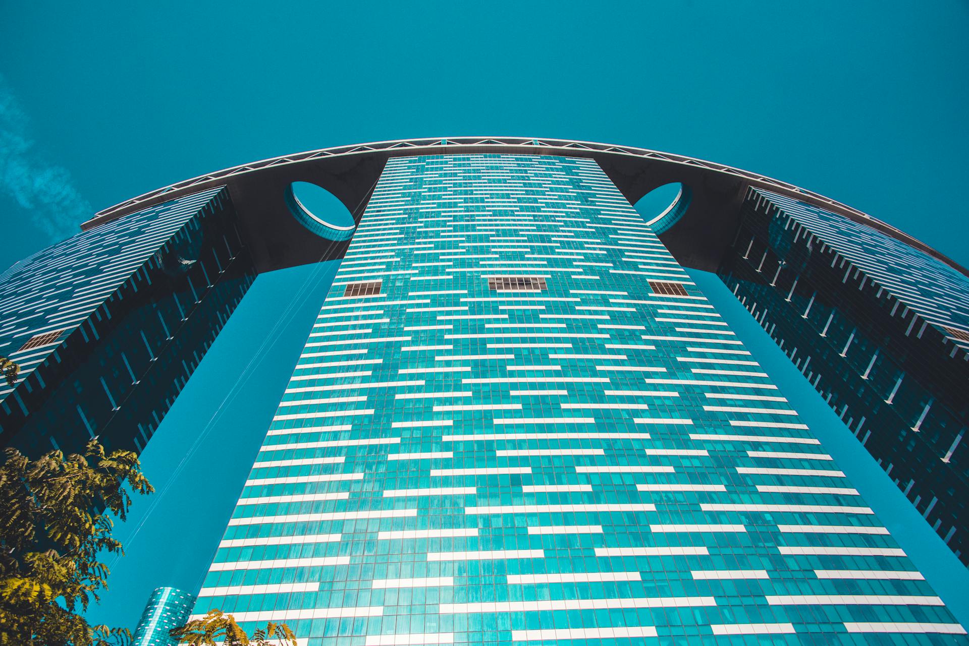 Futuristic skyscraper design in Abu Dhabi, UAE with a unique architectural style.