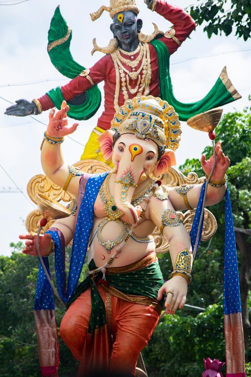 Free Colorful Ganesh Chaturthi festival with vibrant Ganesha statue in Mumbai. Stock Photo