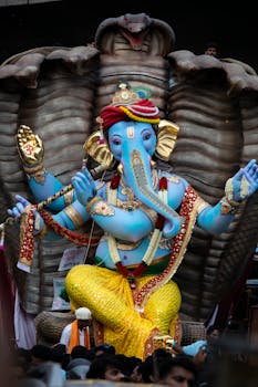 Colorful Ganesha statue during Ganesh Chaturthi celebration in Mumbai, India.