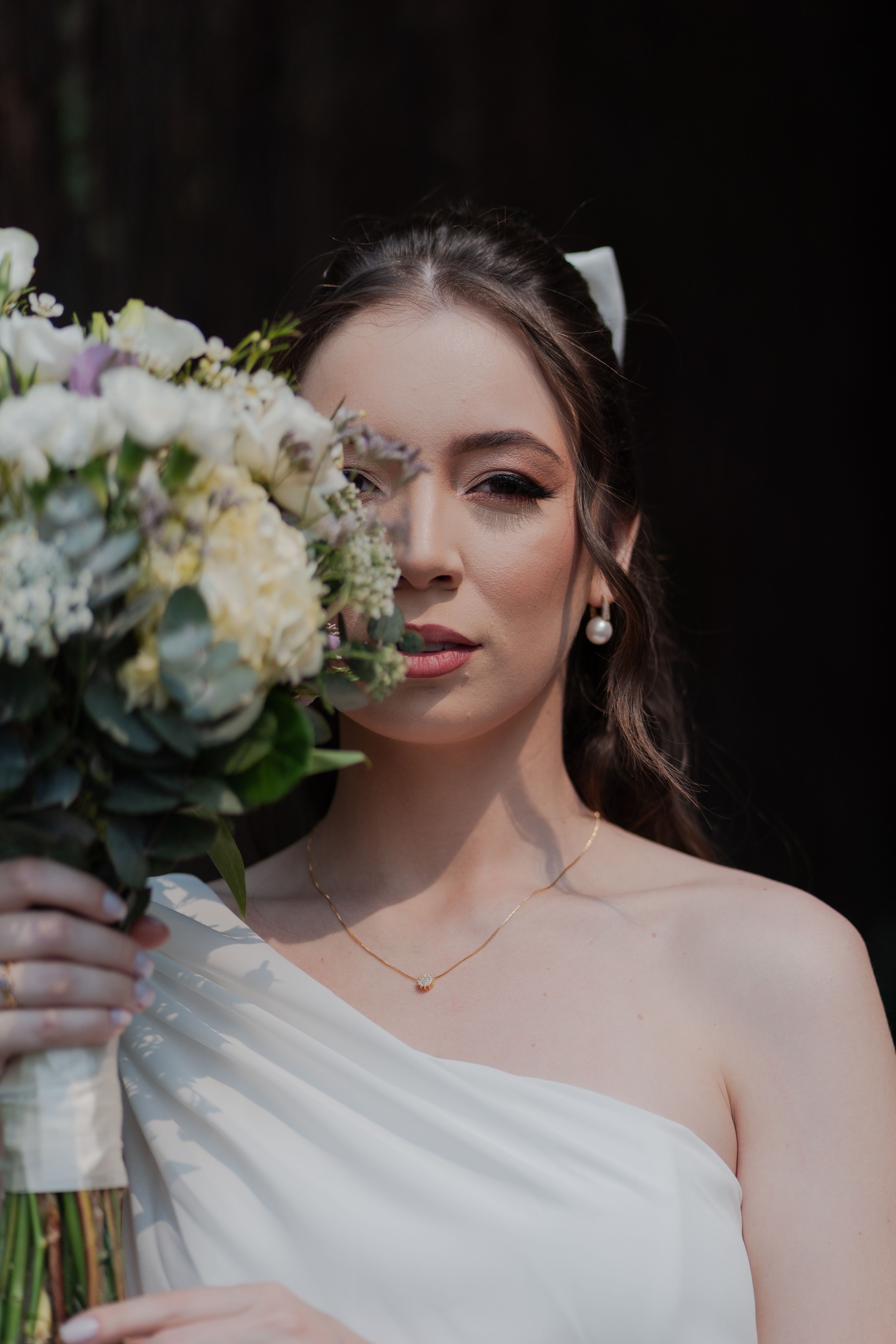 Woman Wearing White Gown Holding Bouquet of Flowers · Free Stock Photo