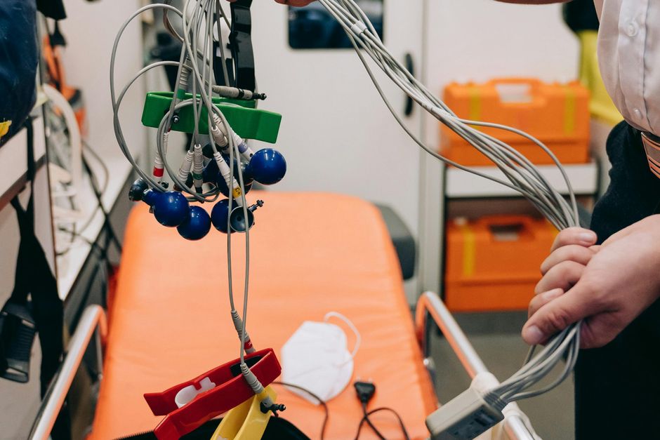 Portable ECG machine sensors and electrode leads — the continuous cardiac telemetry required during an ibogaine ceremony to detect QT prolongation and arrhythmia in real time