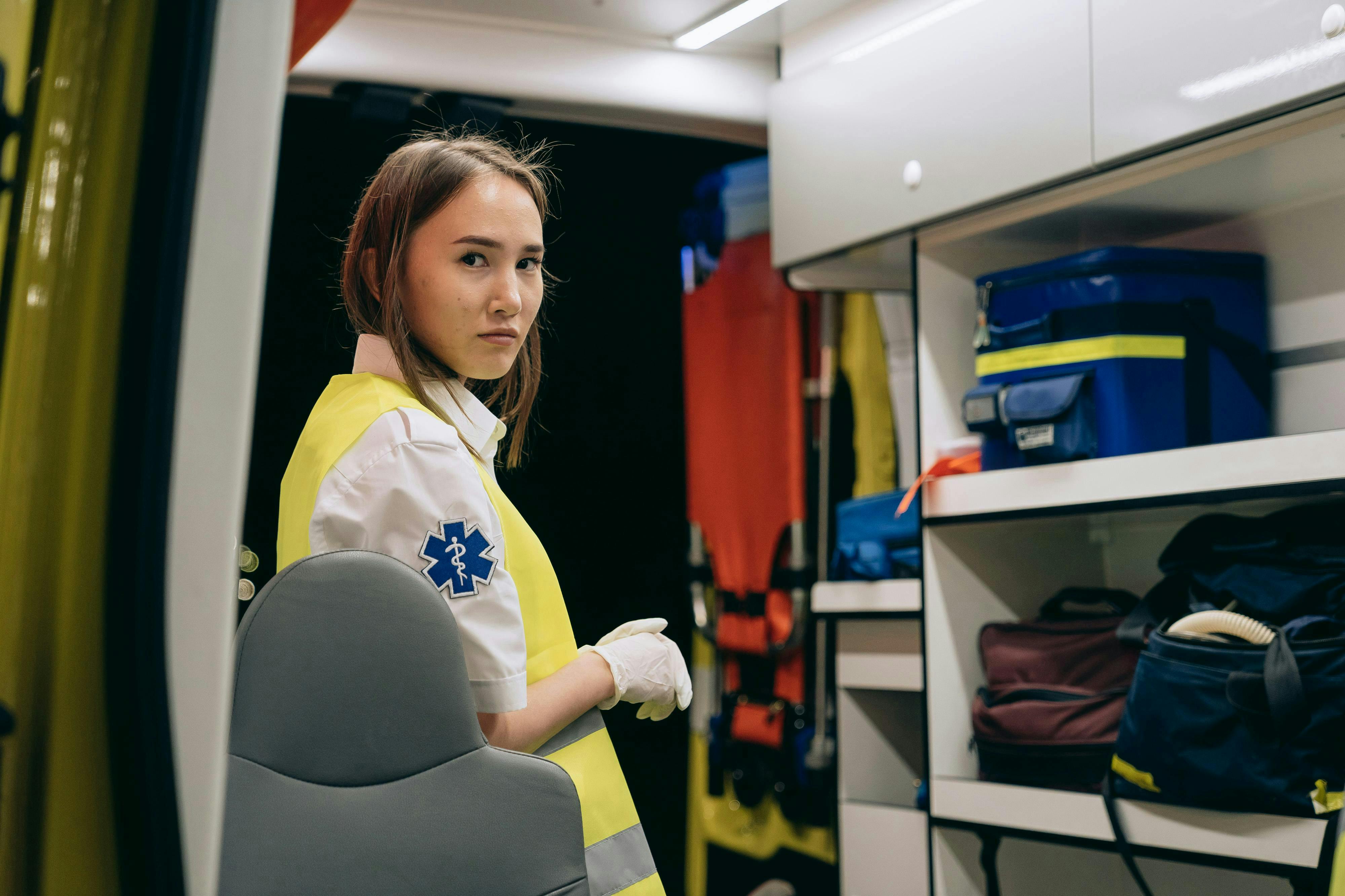 paramedic standing in ambulance