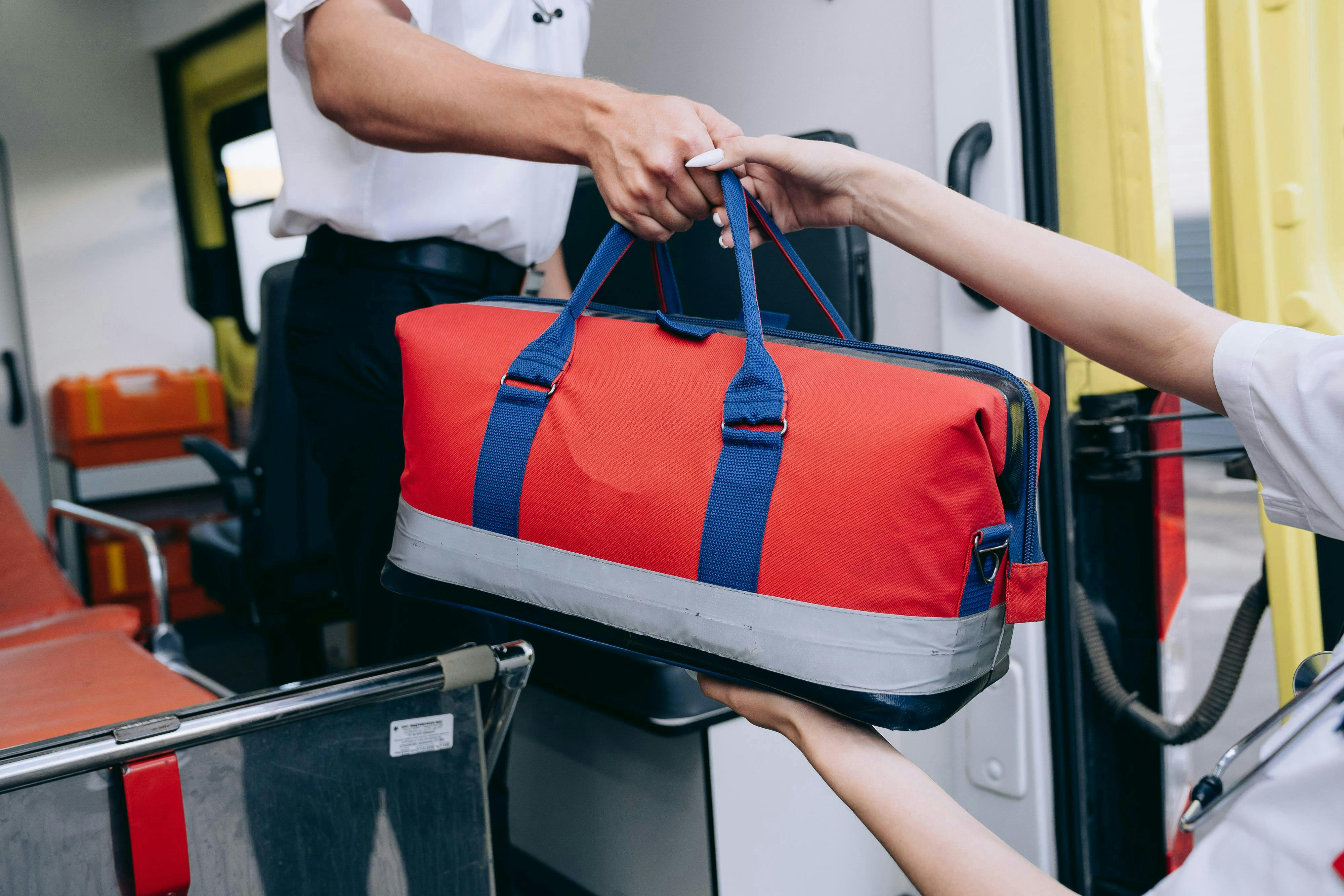 paramedics holding bag