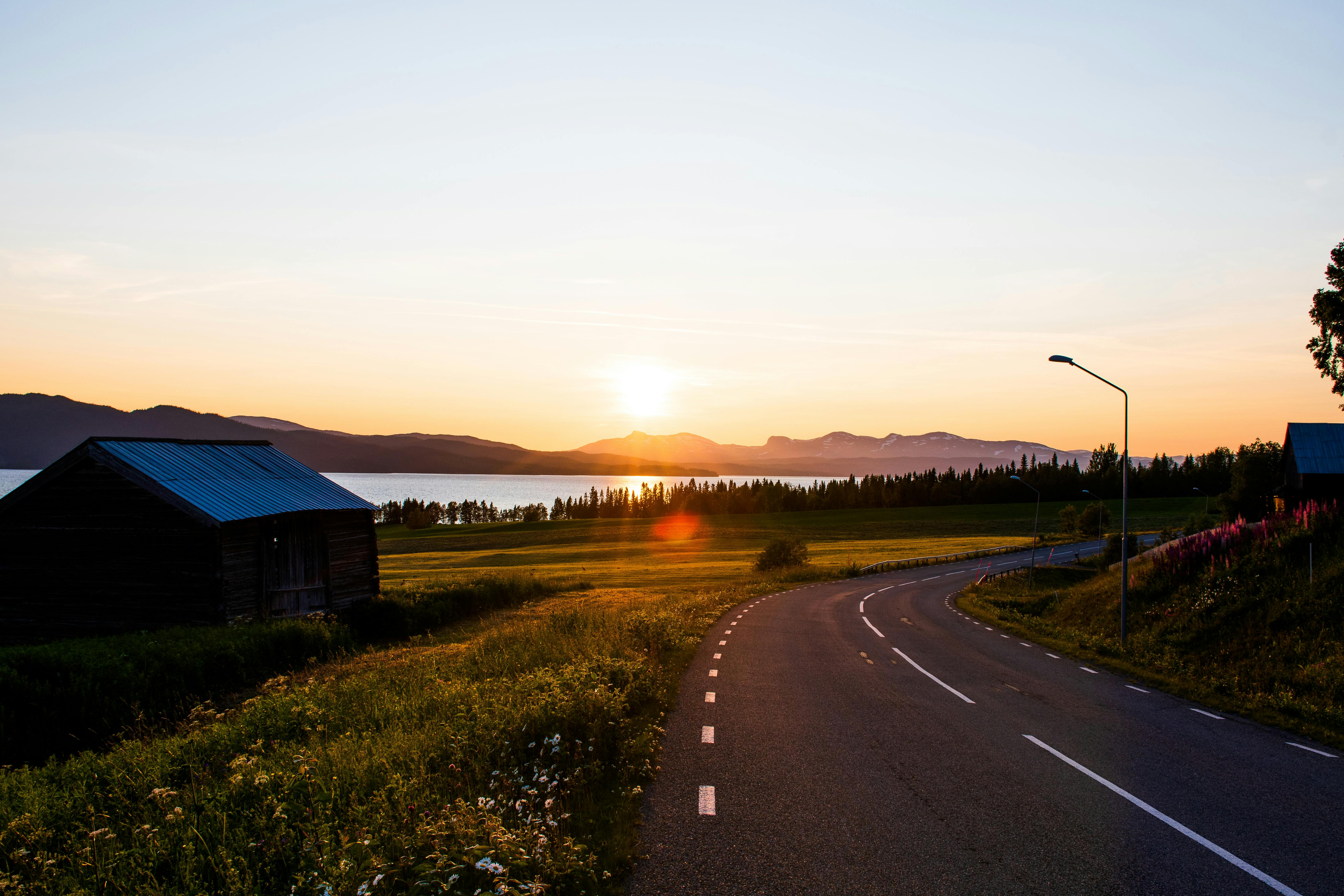Asphalt Road Beside House And River