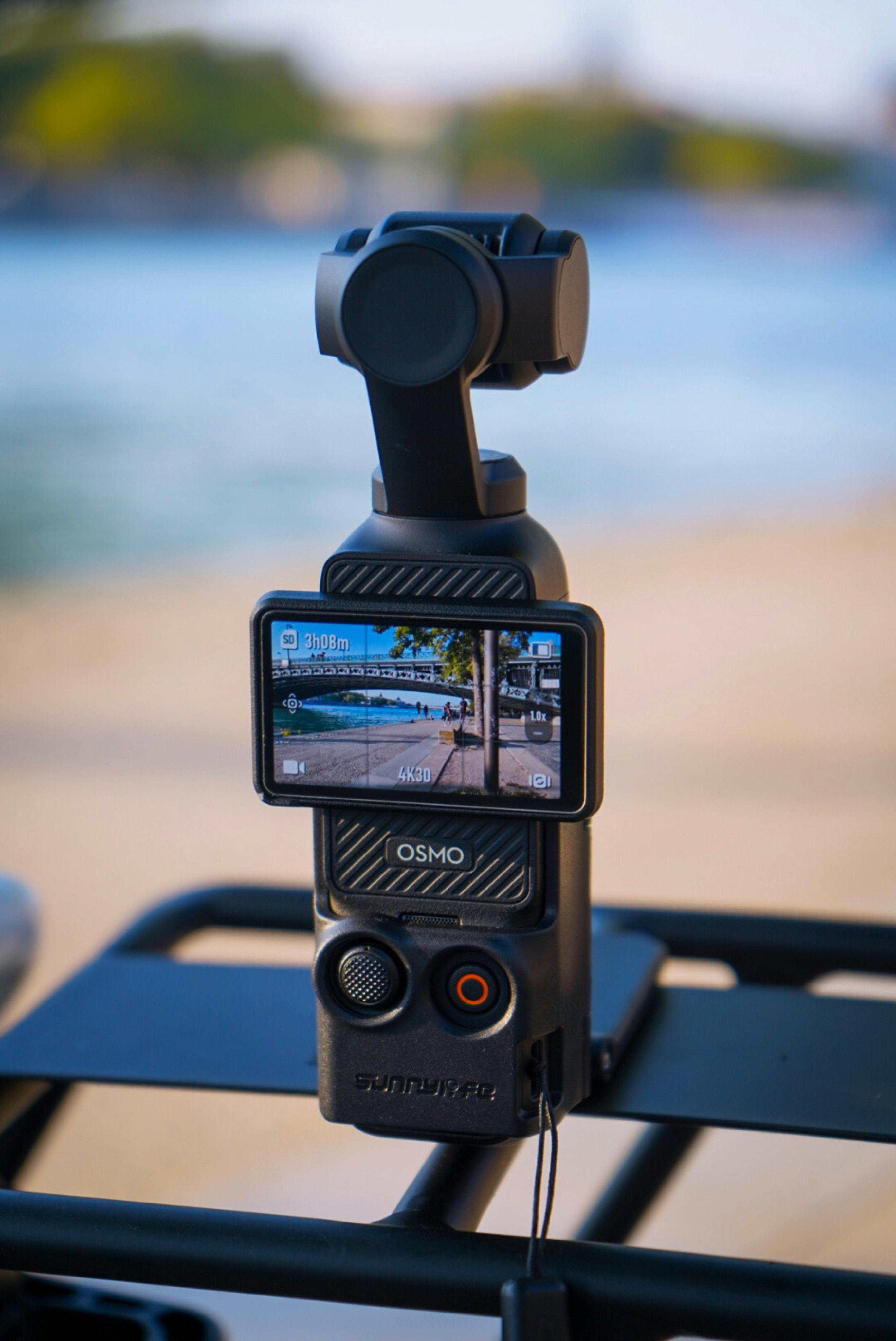 a camera mounted on a tripod on a boat