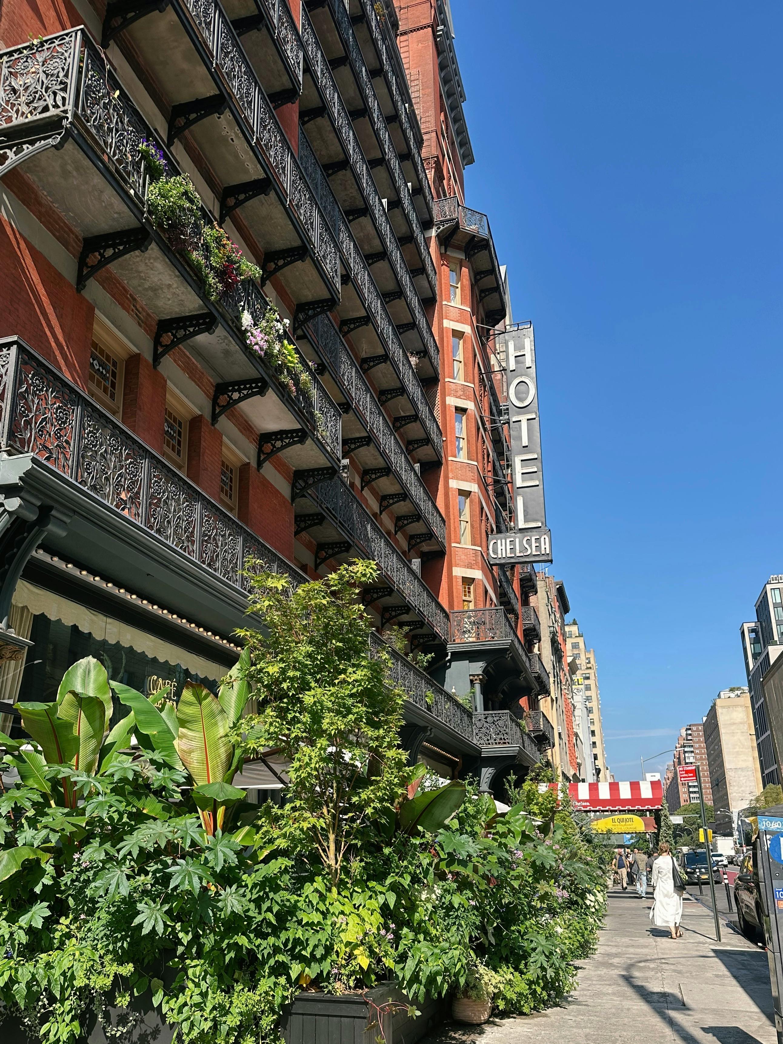 Historic Hotel Chelsea facade in vibrant New York City street scene.