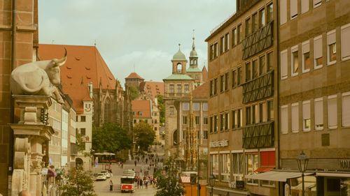 Free Explore the historic charm of Nuremberg's architectural street view featuring prominent landmarks and classic German design. Stock Photo