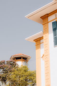 Bright outdoor scene of traditional architectural facade with a sunny sky.