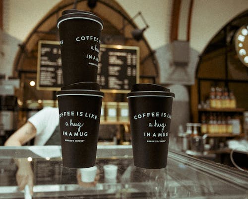 Free Disposable Black-and-white Plastic Coffee Cups Stock Photo