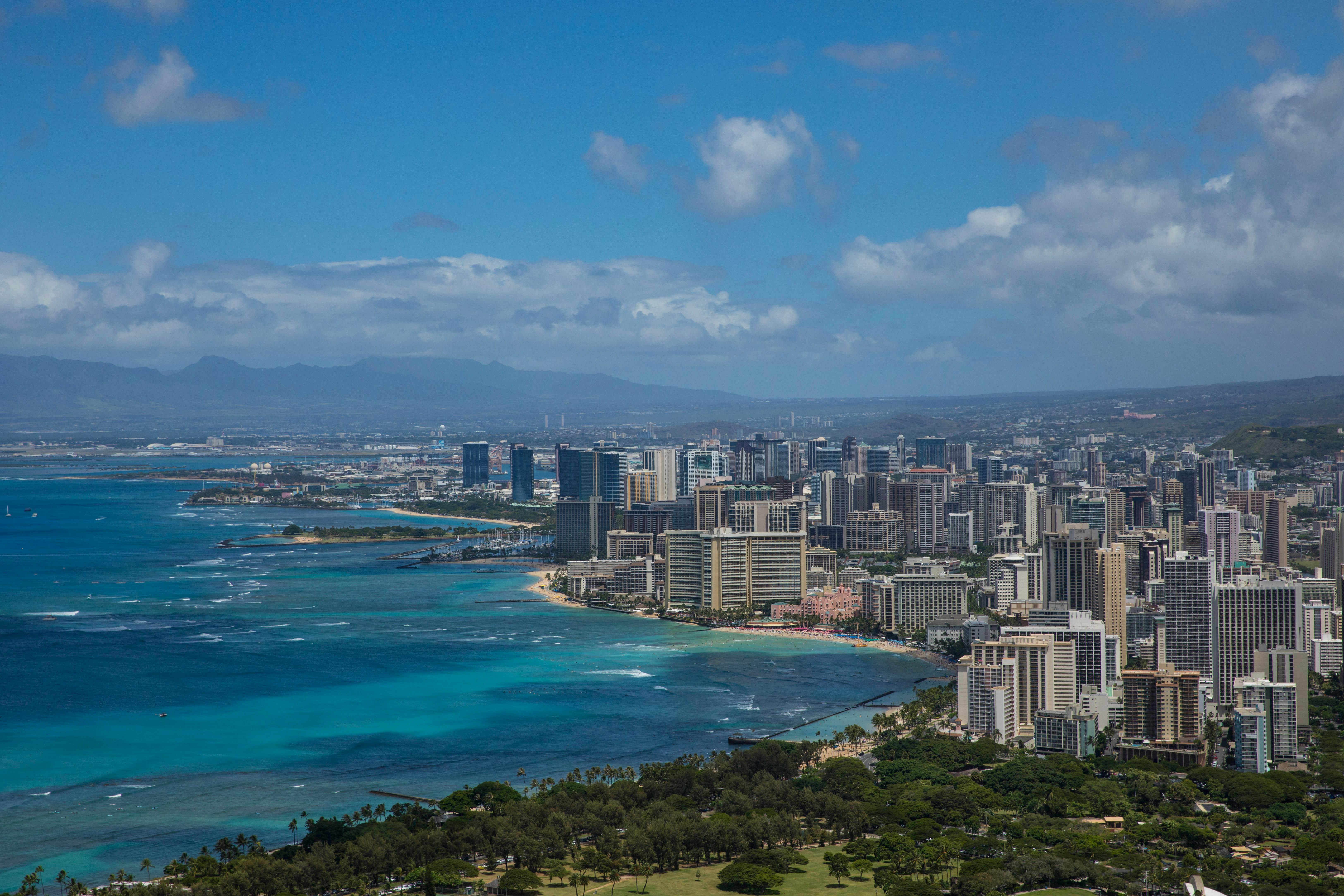 the view from the top of a hill overlooking the city of honolulu