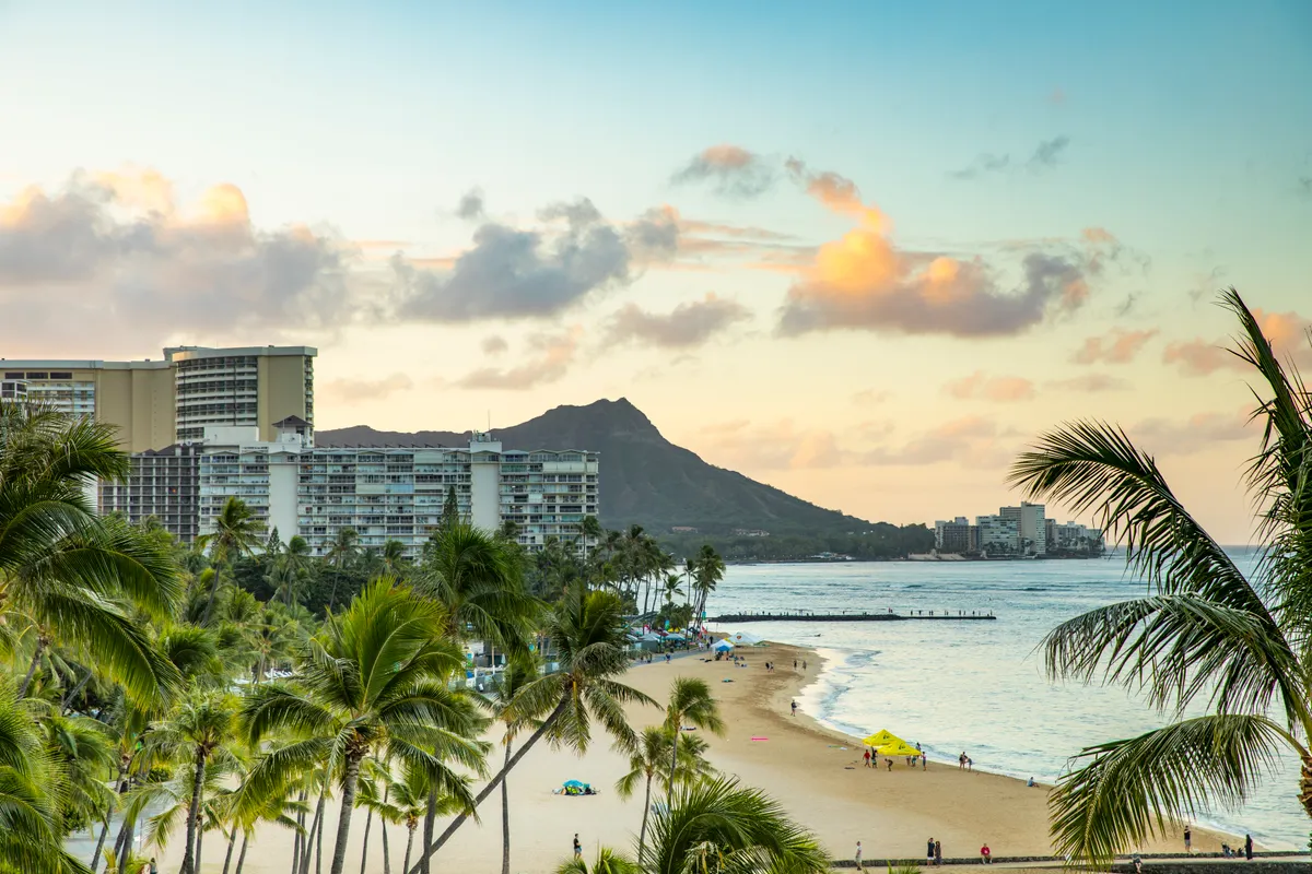 Waikiki Beach and Diamond Head glowing at sunset on Oahu, Hawaii