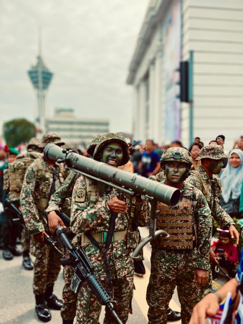 Free A solider carrying his weapon during Malaysian Independence Day  Stock Photo