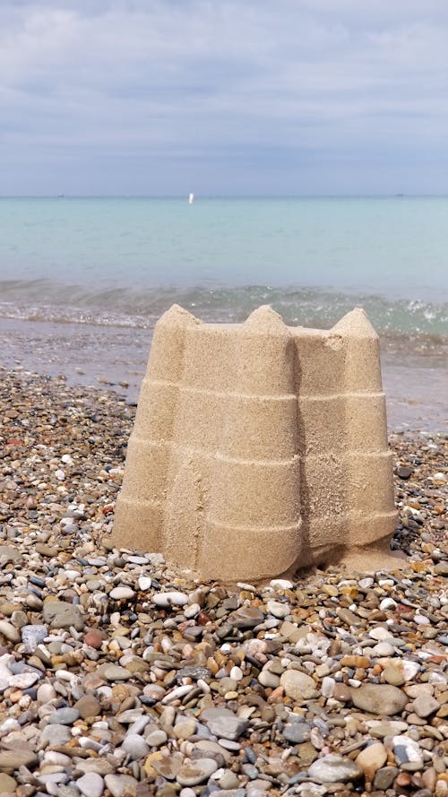 Free stock photo of sandcastle pebbles