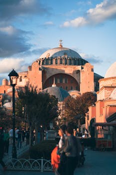 Breathtaking sunset view of Hagia Sophia in Istanbul, showcasing its grand architecture.