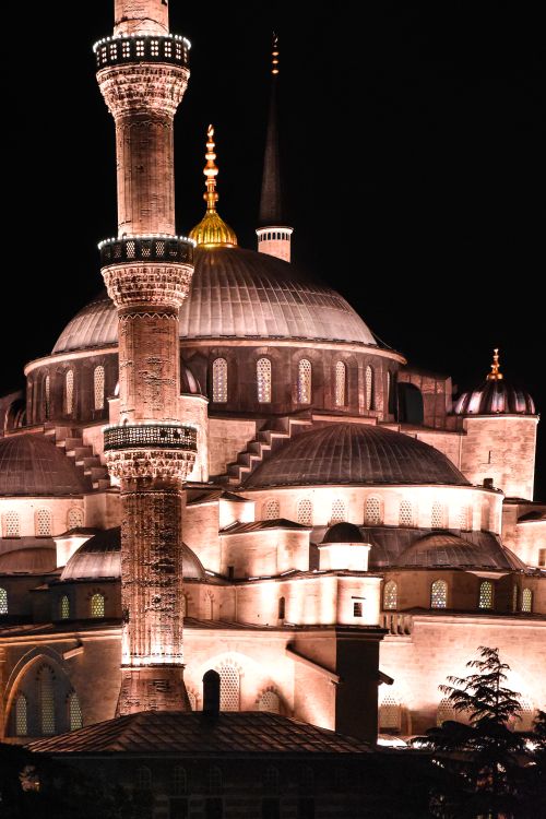 Free Stunning night view of the Hagia Sophia, showing its iconic dome and minarets in Istanbul, Turkey. Stock Photo