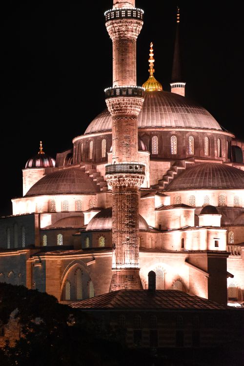 Free A beautifully lit Suleymaniye Mosque captured at night showcasing the architecture of Istanbul, Turkey. Stock Photo