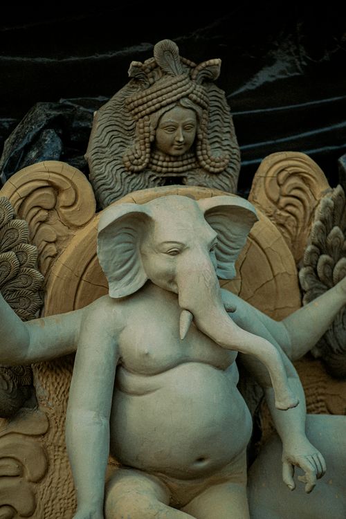 Free Close-up of an ornate Ganesha statue highlighting Hindu religious art and cultural symbolism. Stock Photo