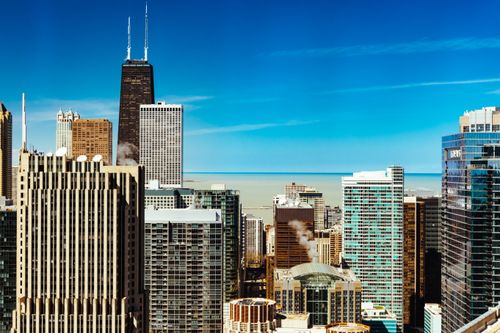 Free Stunning view of Chicago's skyline featuring modern skyscrapers under a clear blue sky. Stock Photo