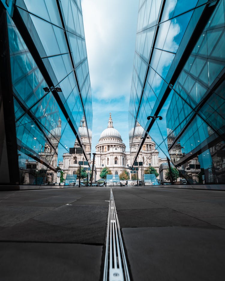 Low Angle Shot Of St. Paul's Cathedral Between Glass Buildings