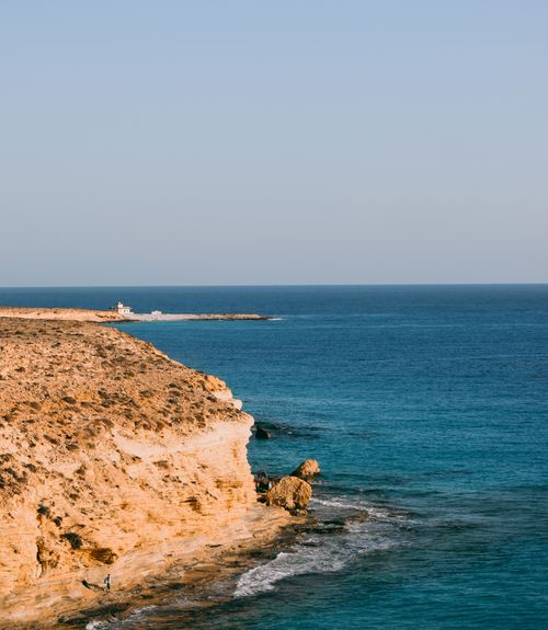 Free Explore the stunning cliffs and pristine waters of Marsa Matruh, Egypt's coastal beauty. Stock Photo