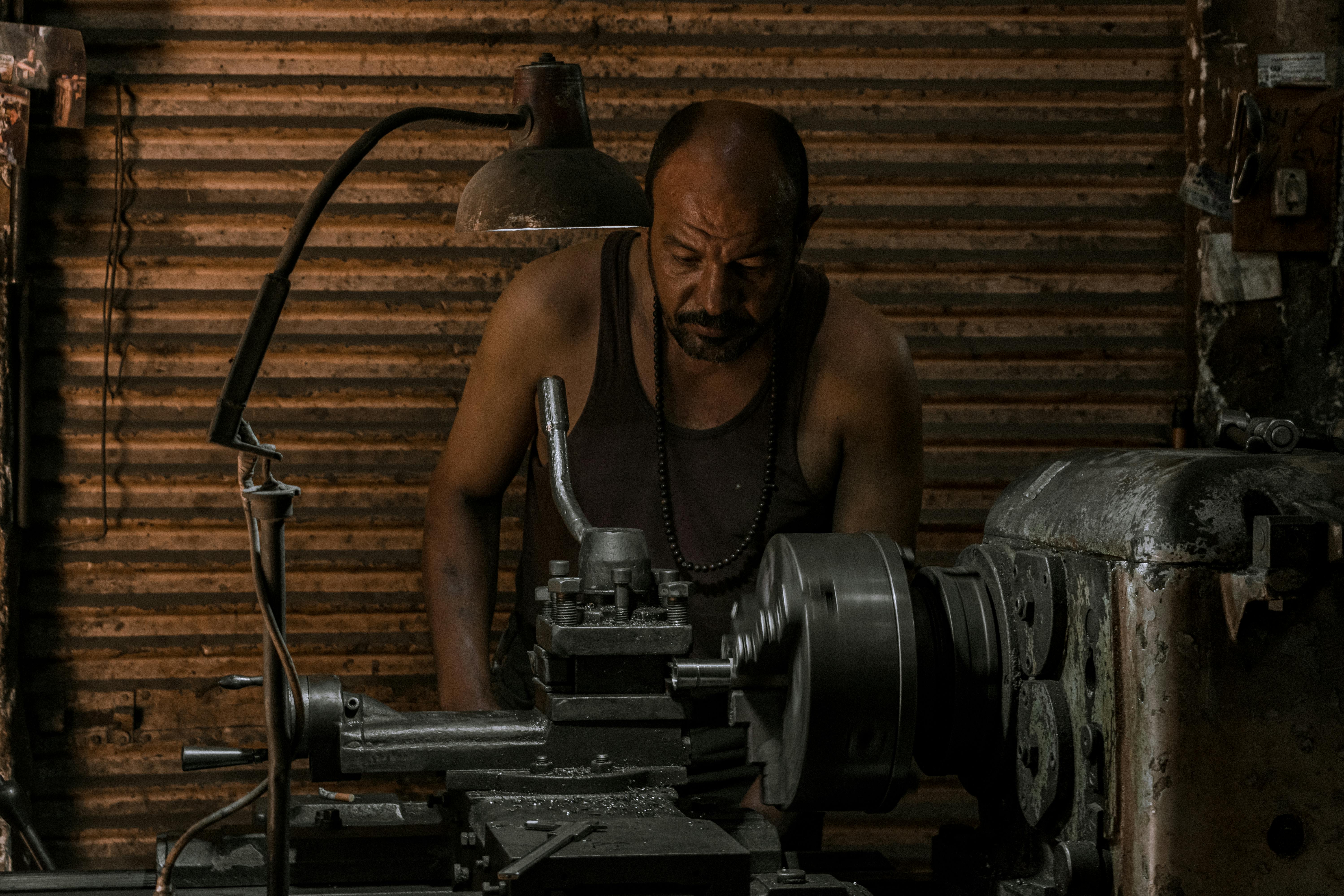 A skilled blacksmith crafts metal goods in his Alexandria, Egypt workshop.