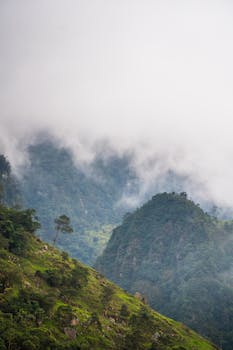 Breathtaking view of misty mountains in San Francisco, Cundinamarca, Colombia.