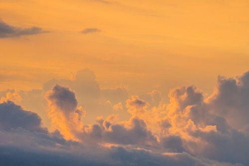 Free A breathtaking sunset with dramatic clouds over the Colombian mountains. Perfect for nature lovers. Stock Photo