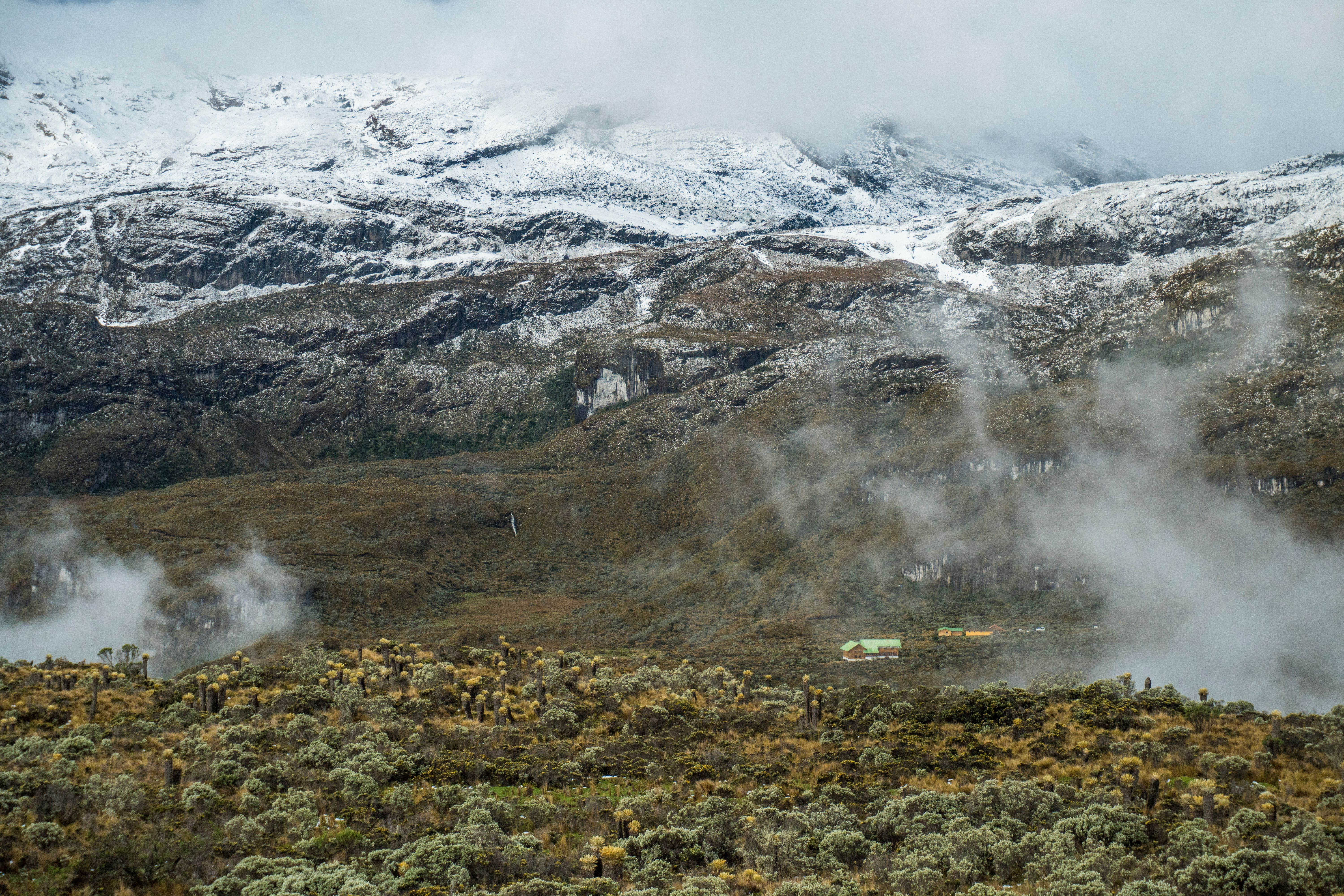 Scenic snowy peaks and mist in Manizales, Colombia's mountainous terrain.