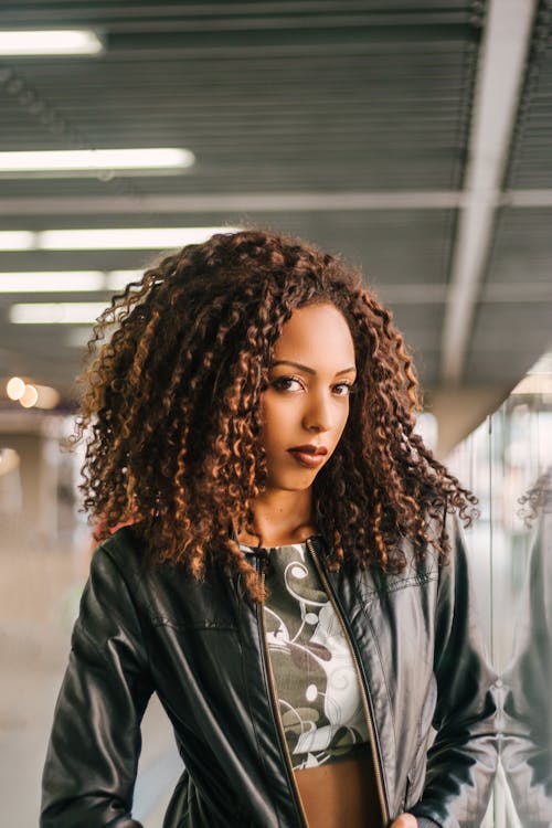 Woman Wearing Black Zip-up Leather Jacket