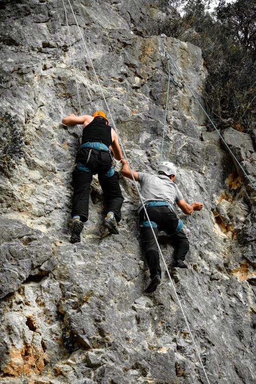 Free Two climbers tackling a challenging rock face in Yalova, showcasing strength and courage. Stock Photo