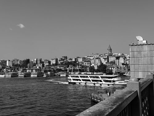 Free Monochrome view of Istanbul's skyline featuring Galata Tower and the Bosphorus. Stock Photo