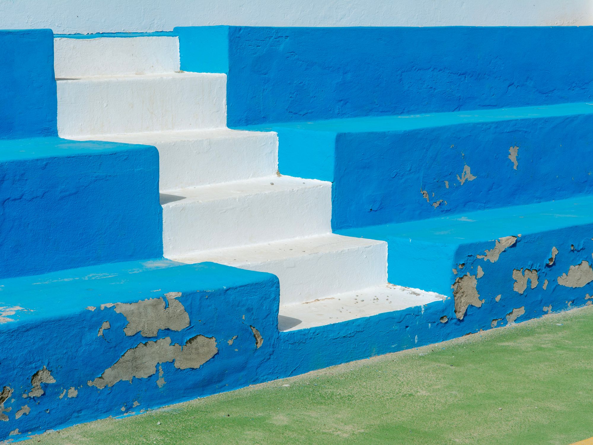 Painters & Decorators in Sipson, London — professional decorator painting a wall with a roller