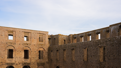 Free Ancient stone fortress ruins on Öland Island, Sweden, under a clear summer sky. Stock Photo