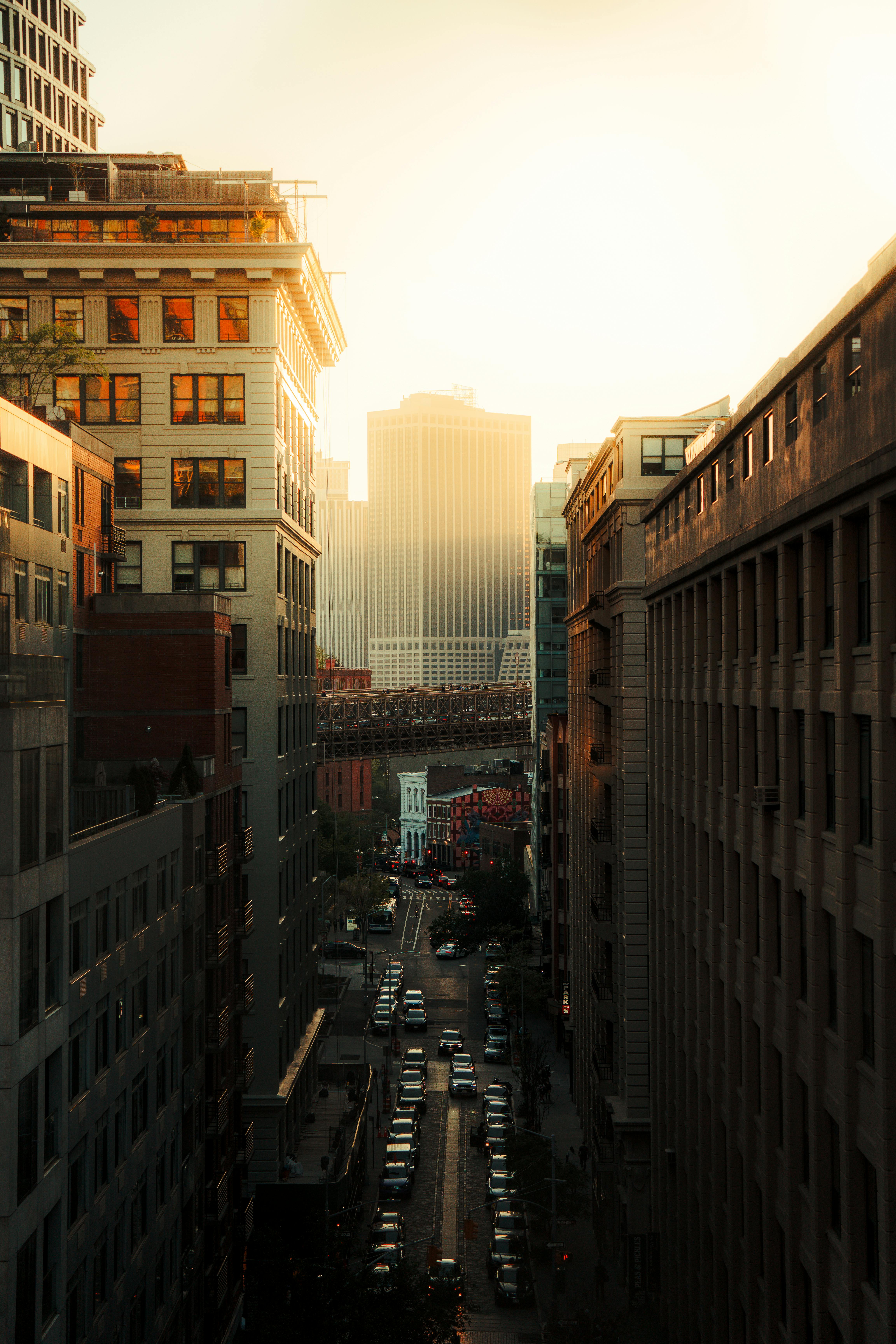 city glowing sunset framed by buildings