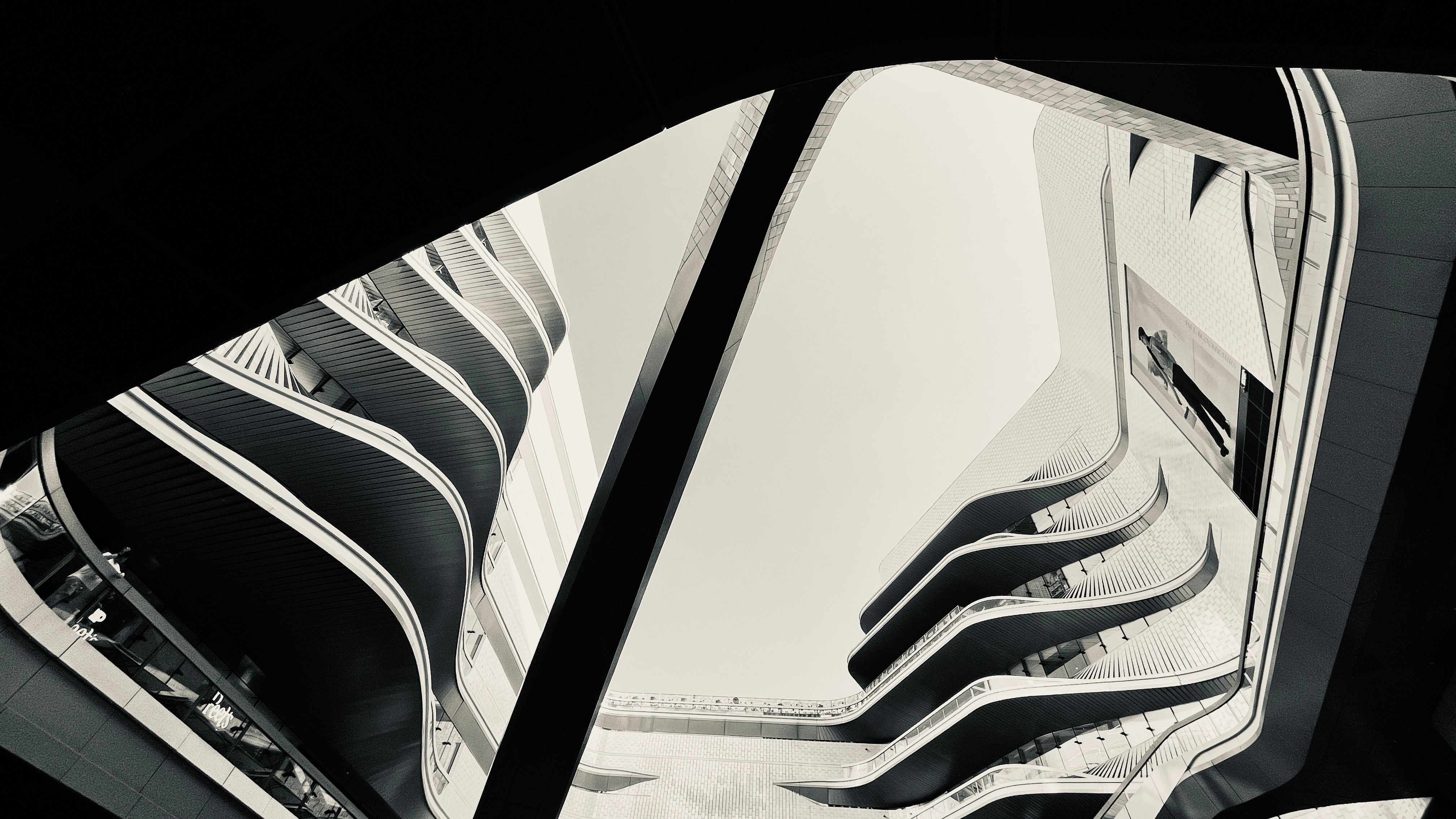 Jing'an Library in Shanghai is a tech-forward urban oasis, blending digital resources with modern design.