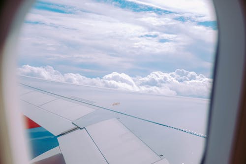 Free Scenic View of White Clouds from the Airplane Stock Photo