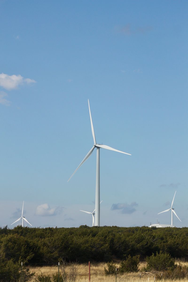 Wind turbines in an open field