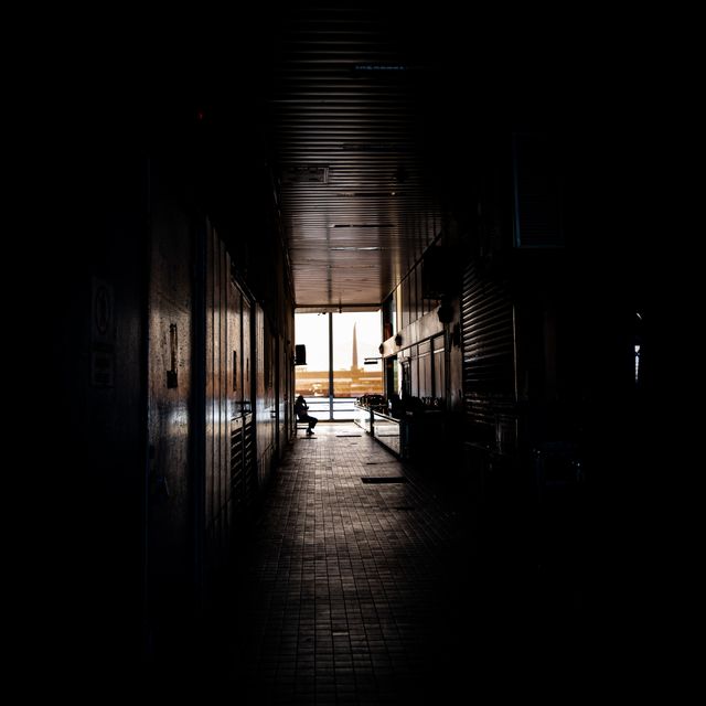 Dim interior corridor at night, photo by Mehmet Ali Dalyan on Pexels