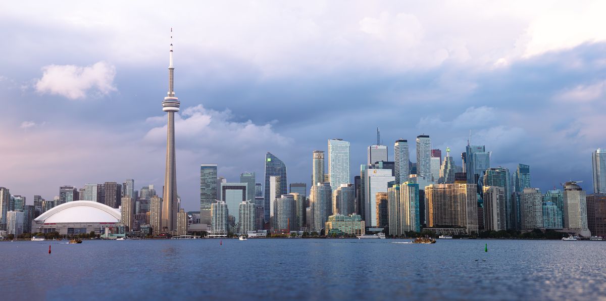 Toronto skyline at sunset with the CN Tower in the distance