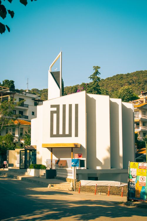 Free Contemporary mosque design with unique architecture in a Turkish village setting. Stock Photo