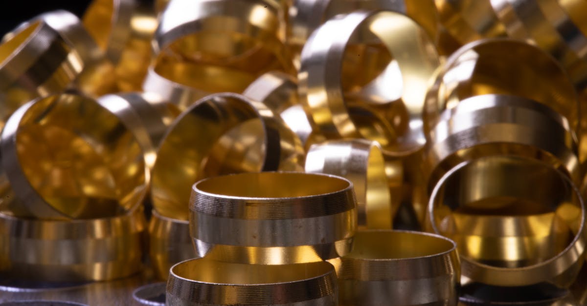Detailed view of brass and copper rings showcasing metallic shine and industrial precision.
