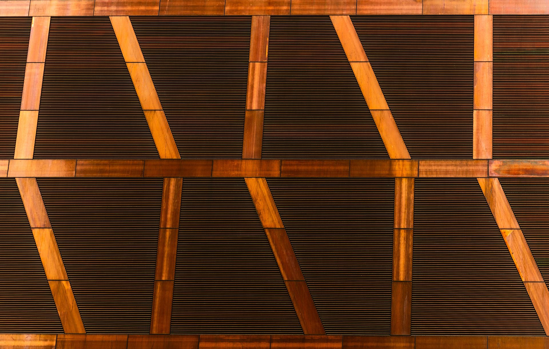 A close up of a wooden panel with a pattern