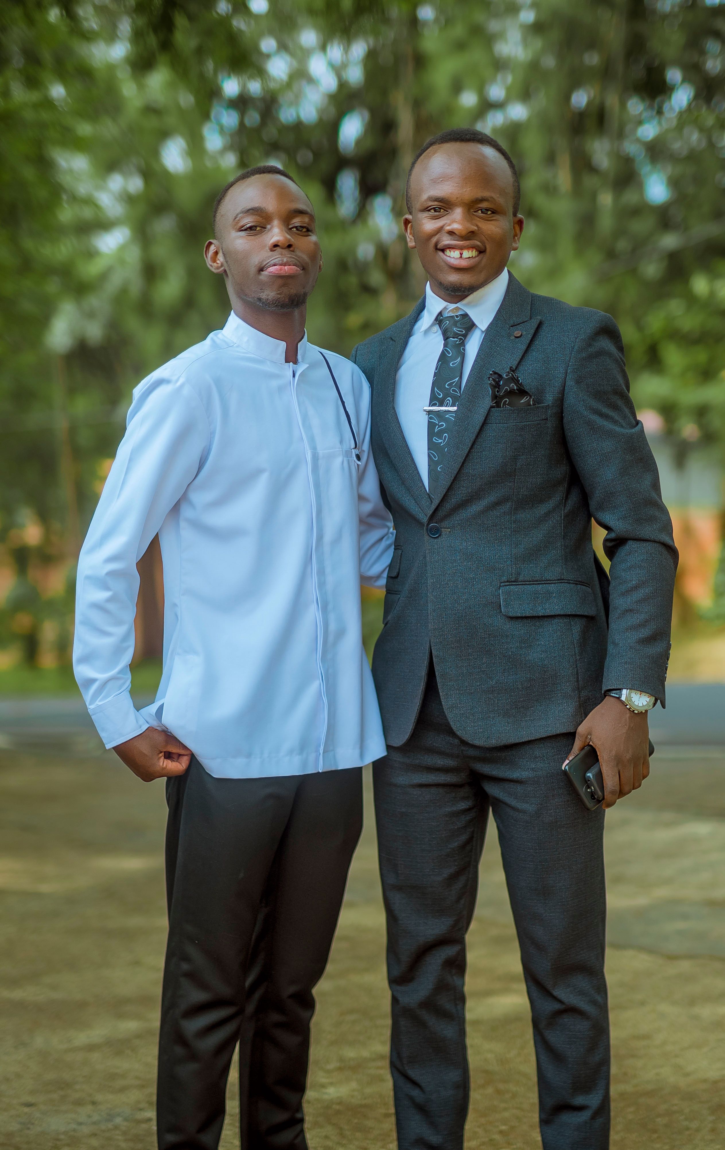 Two men in suits standing next to each other · Free Stock Photo
