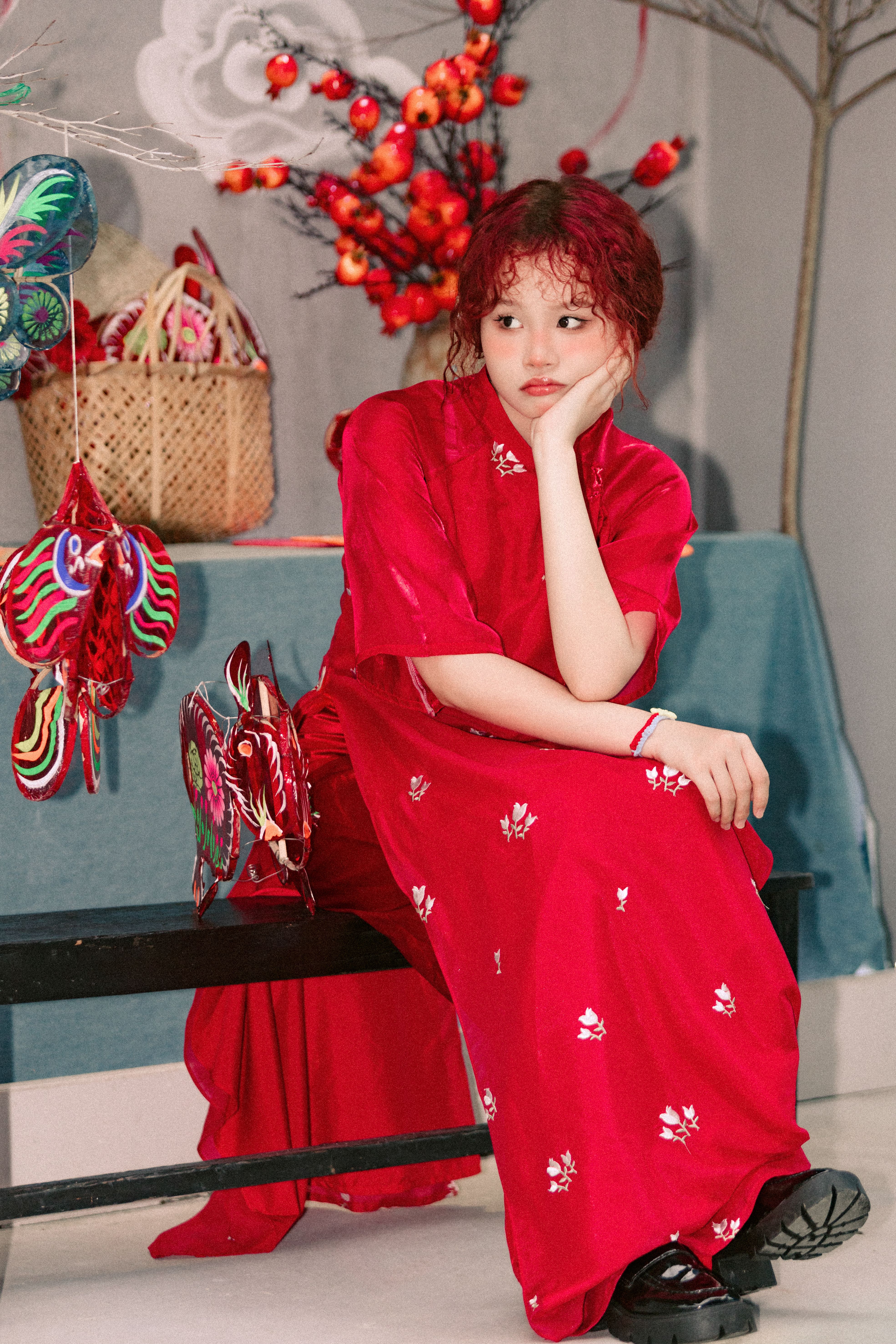 A woman in a red dress sitting on a bench · Free Stock Photo